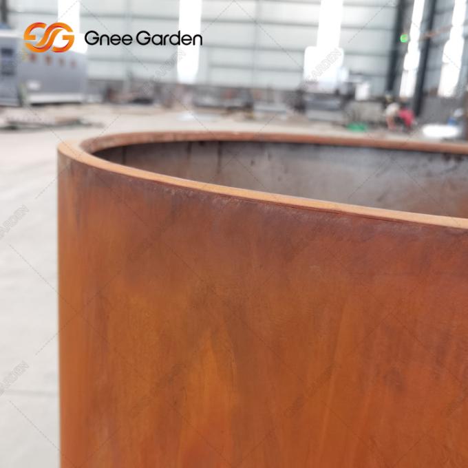 Коробки плантатора металла цветочных горшков Corten на открытом воздухе круга задворк стальные
