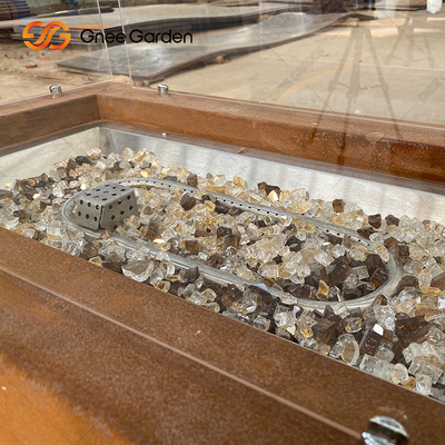 На открытом воздухе располагаясь лагерем сталь Firepit Corten плиты большого костра ямы огня деревянная
